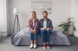 Happy couple on bed